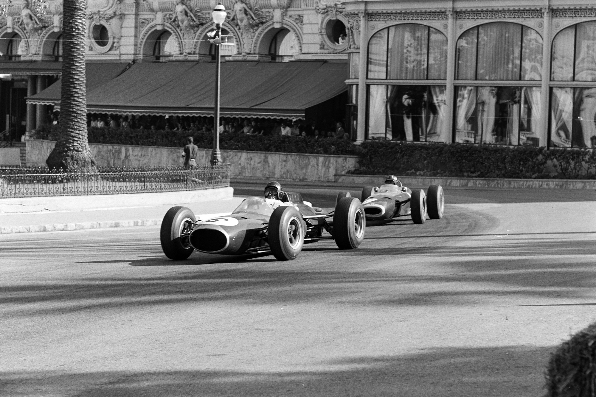 Dan Gurney, Brabham BT7 Climax, leads Graham Hill, BRM P261.