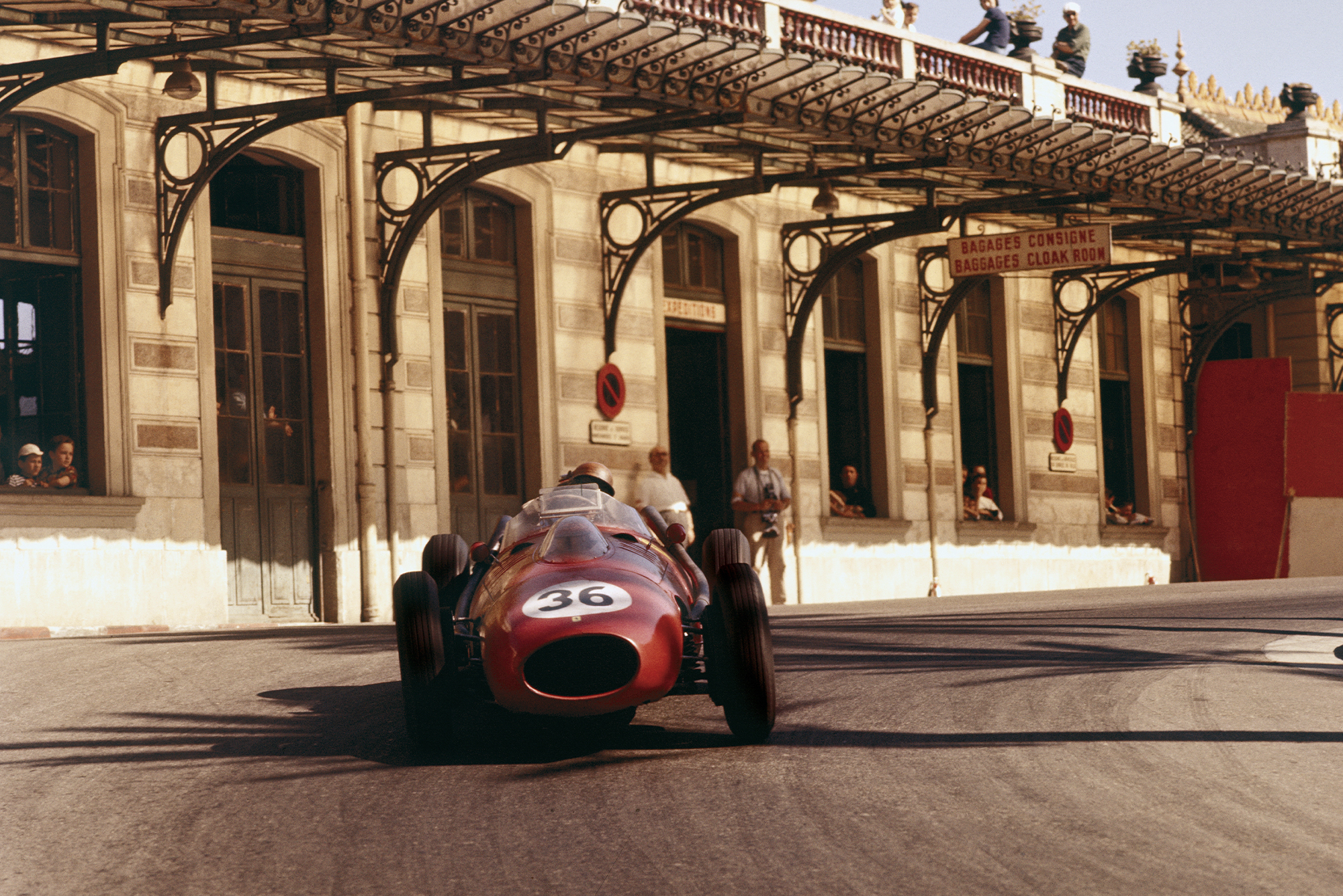 Peter Collins rounds the hairpin in his Ferrari Dino 246