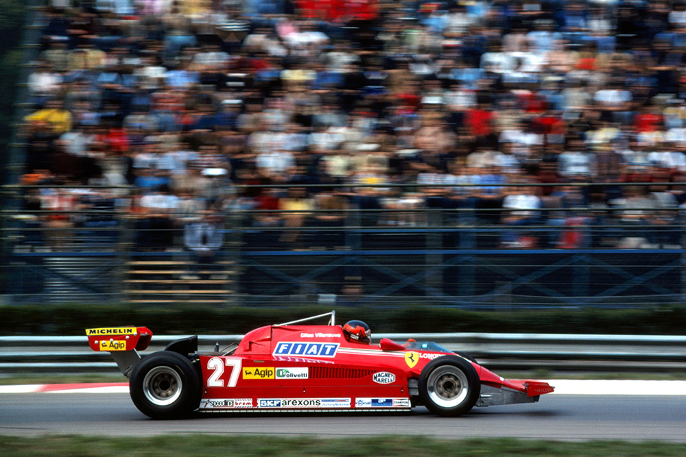 Gilles Villeneuve in a Ferrari 126CK, ground to a halt early in the race with a blown turbo.