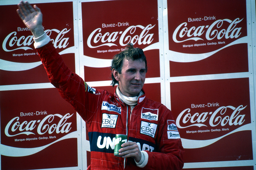 Race winner John Watson on the podium.