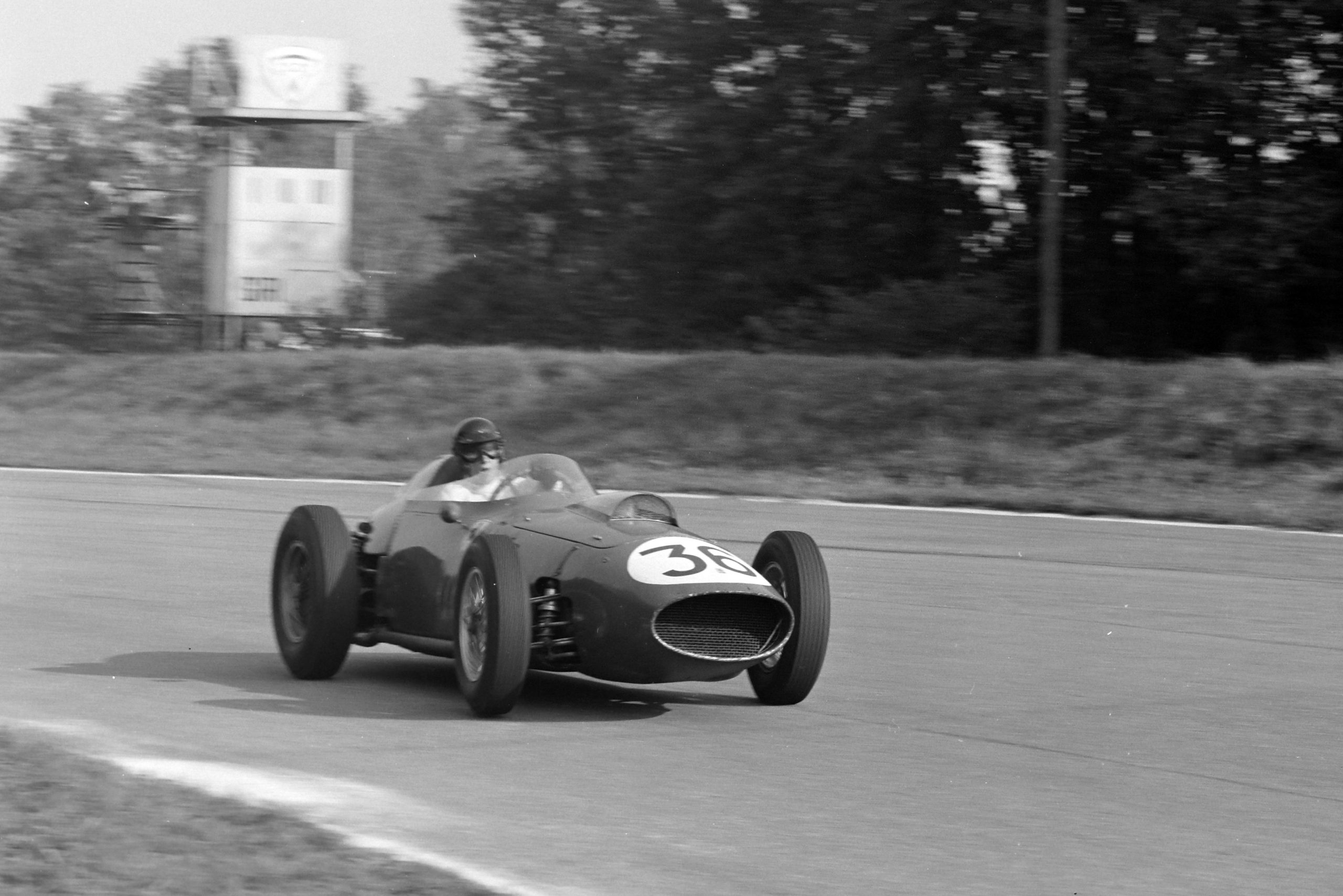 Dan Gurney driving a Ferrari 246.