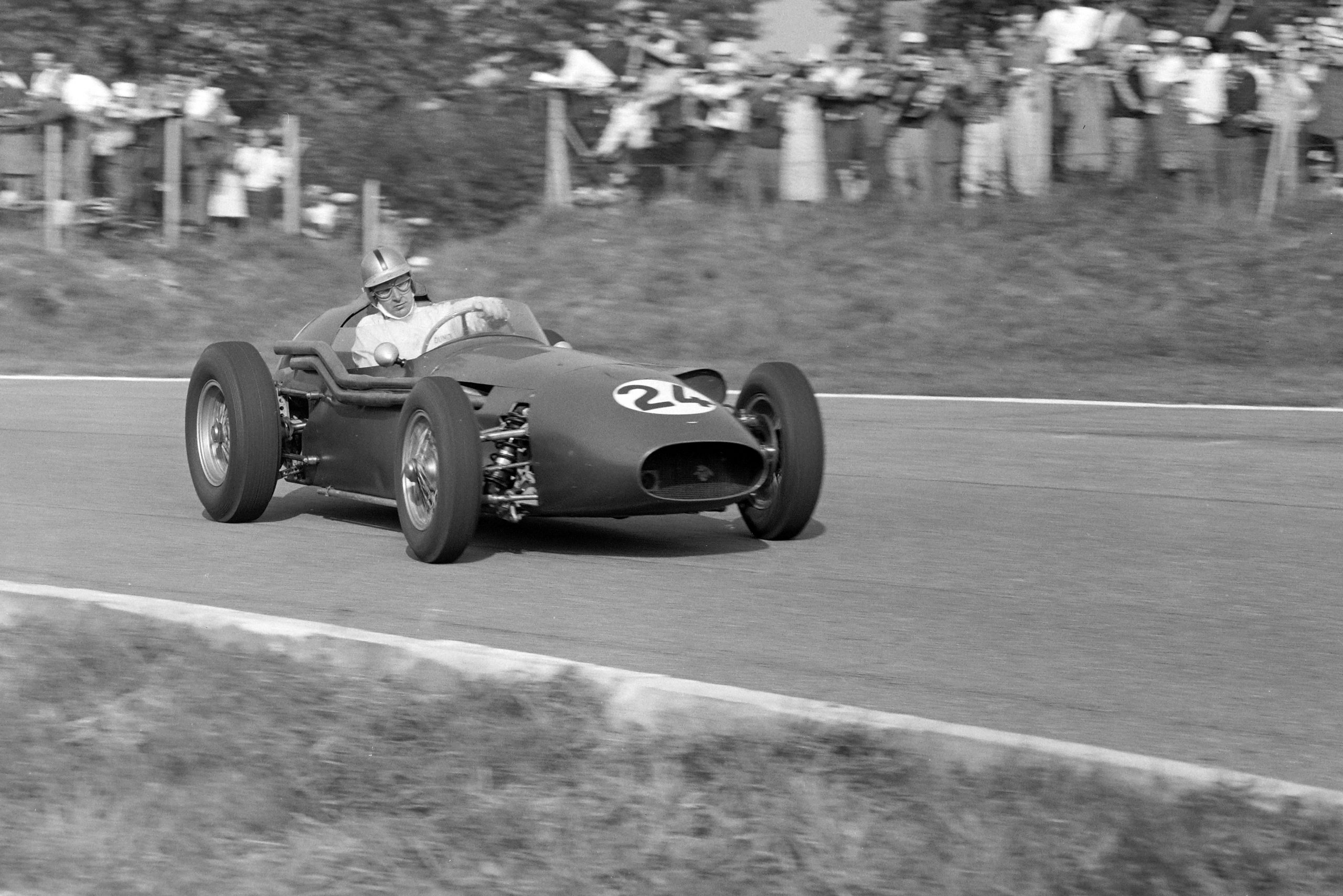 Roy Salvadori at the wheel of his Aston Martin DBR4/250