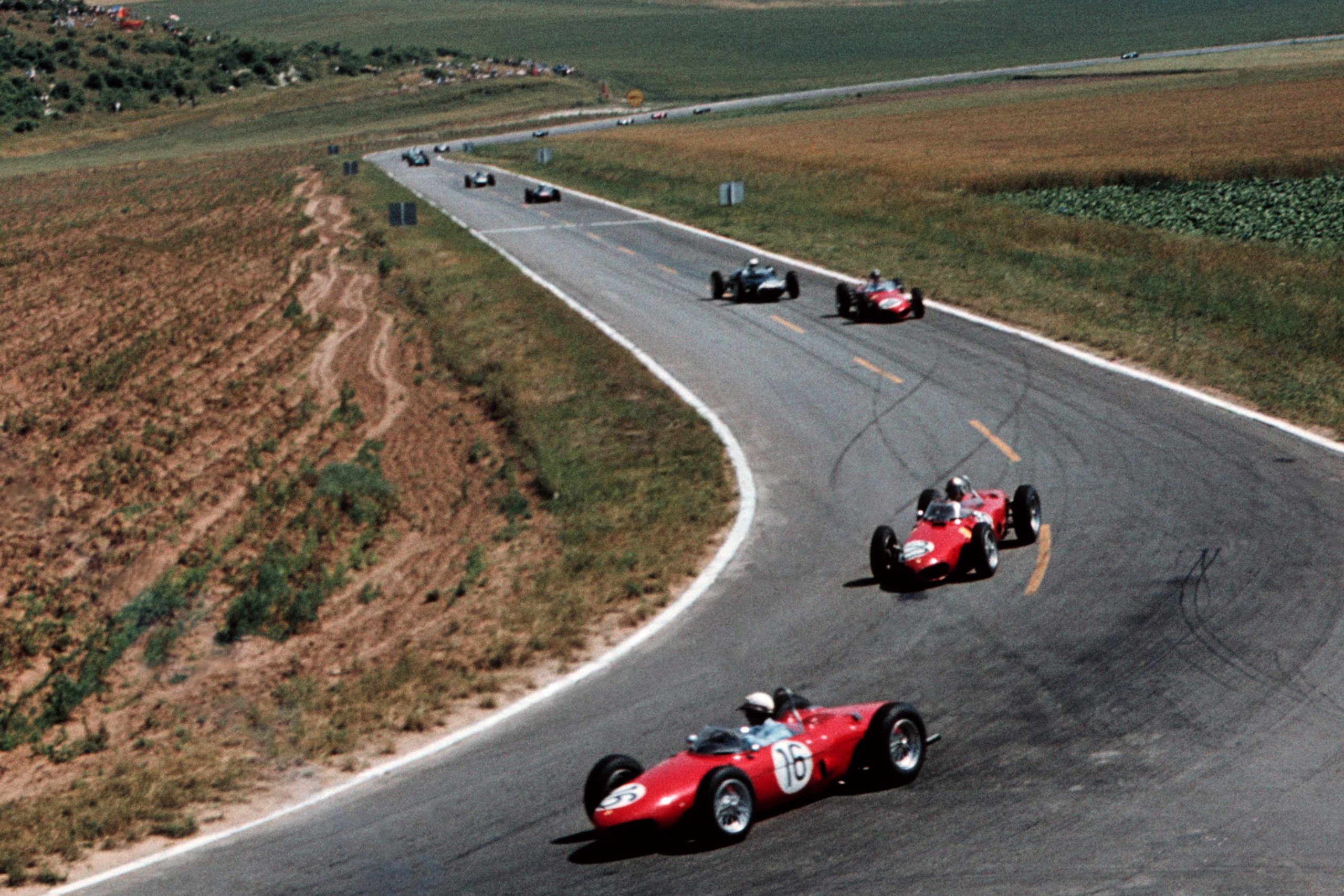 Phil Hill leads team mate Wolfgang von Trips in their Ferrari 156s.