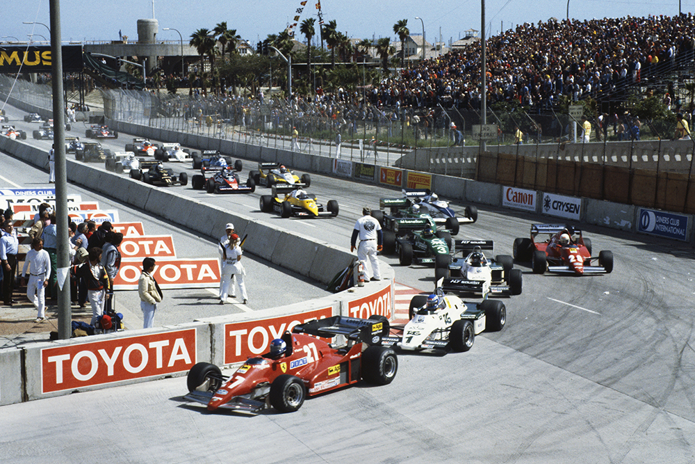 Patrick Tambay (Ferrari 126C2B), Keke Rosberg (Williams FW08C Ford), Jacques Laffite (Williams FW08C Ford), René Arnoux (Ferrari 126C2B), and Michele Alboreto (Tyrrell 011 Ford), lead at the start.