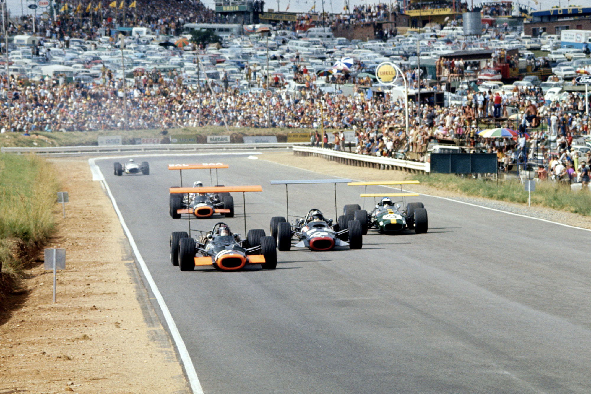 Jackie Oliver (BRM) battles with Pedro Rodriguez (BRM) and Jacky Ickx (Brabham).