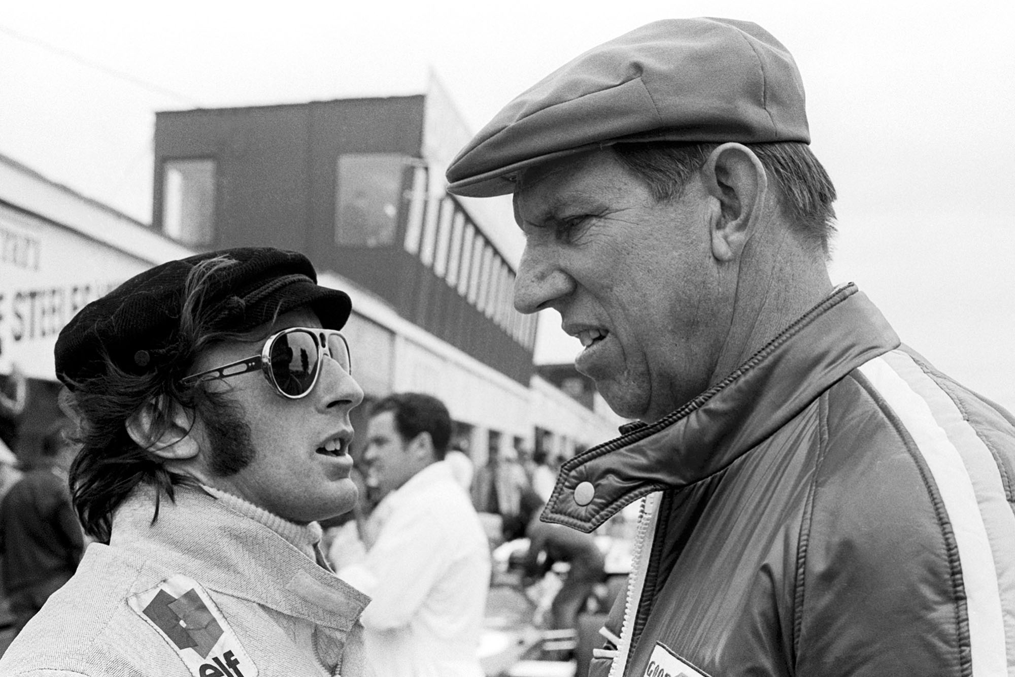 Jackie Stewart confers with team boss Ken Tyrrell.