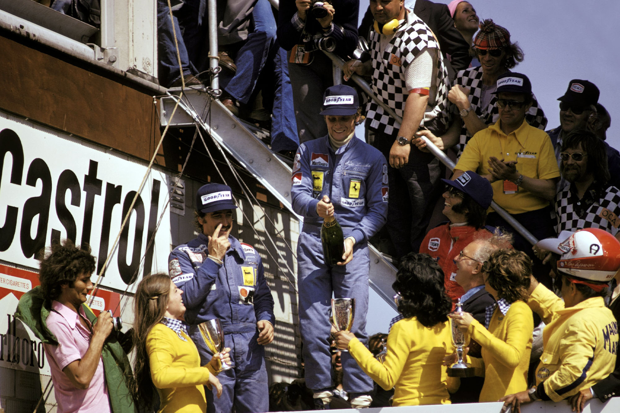 Nikia Lauda (Ferrari) celebrates winning the 1974 Dutch Grand Prix on the podium.