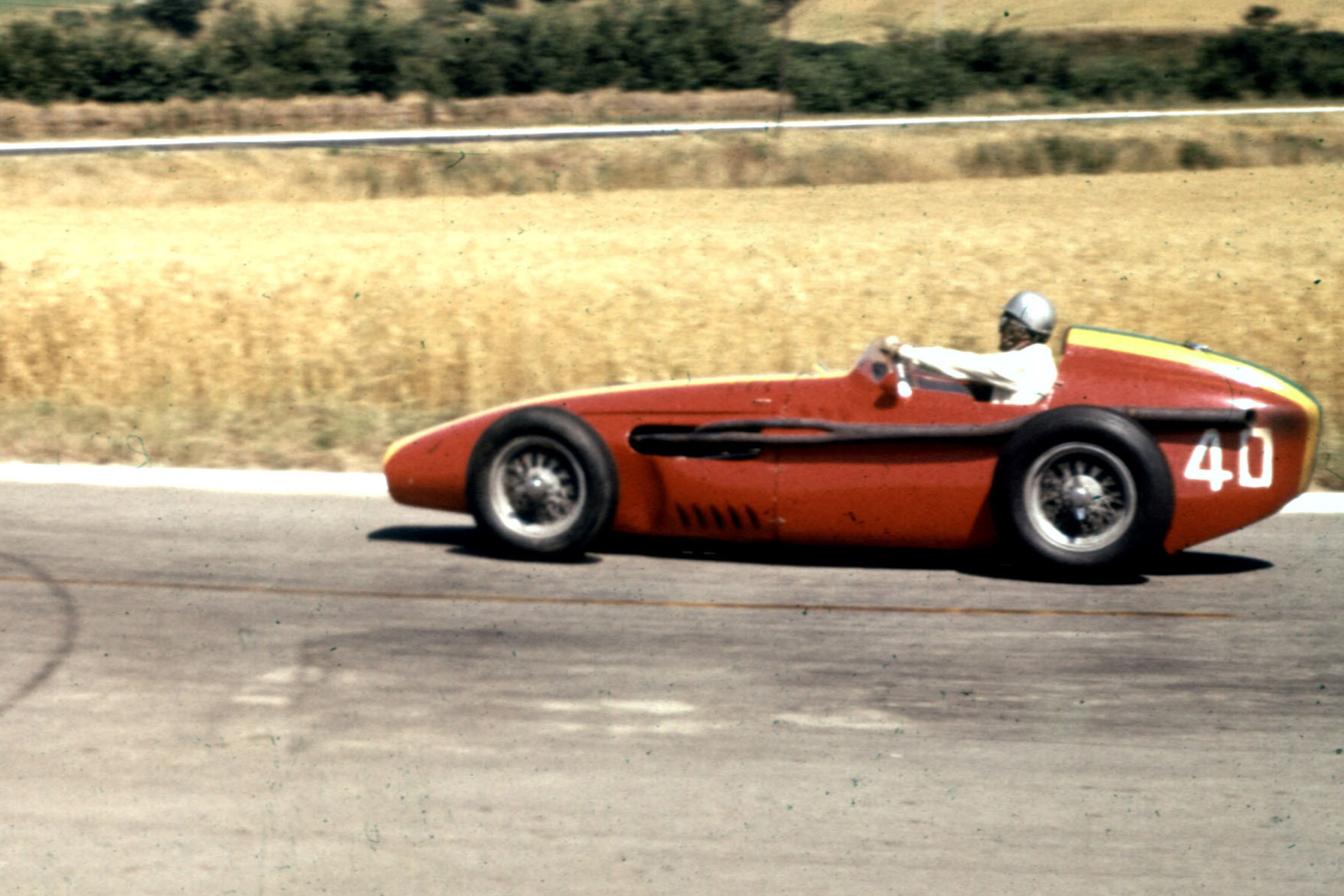 Giorgio Scarlatti driving a Maserati 250F.