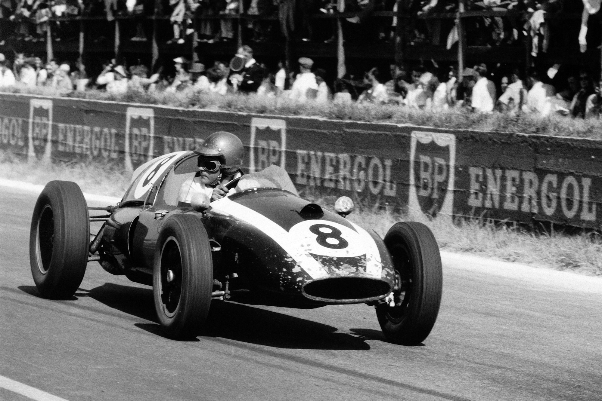 Jack Brabham driving his Cooper T51-Climax to 3rd position.