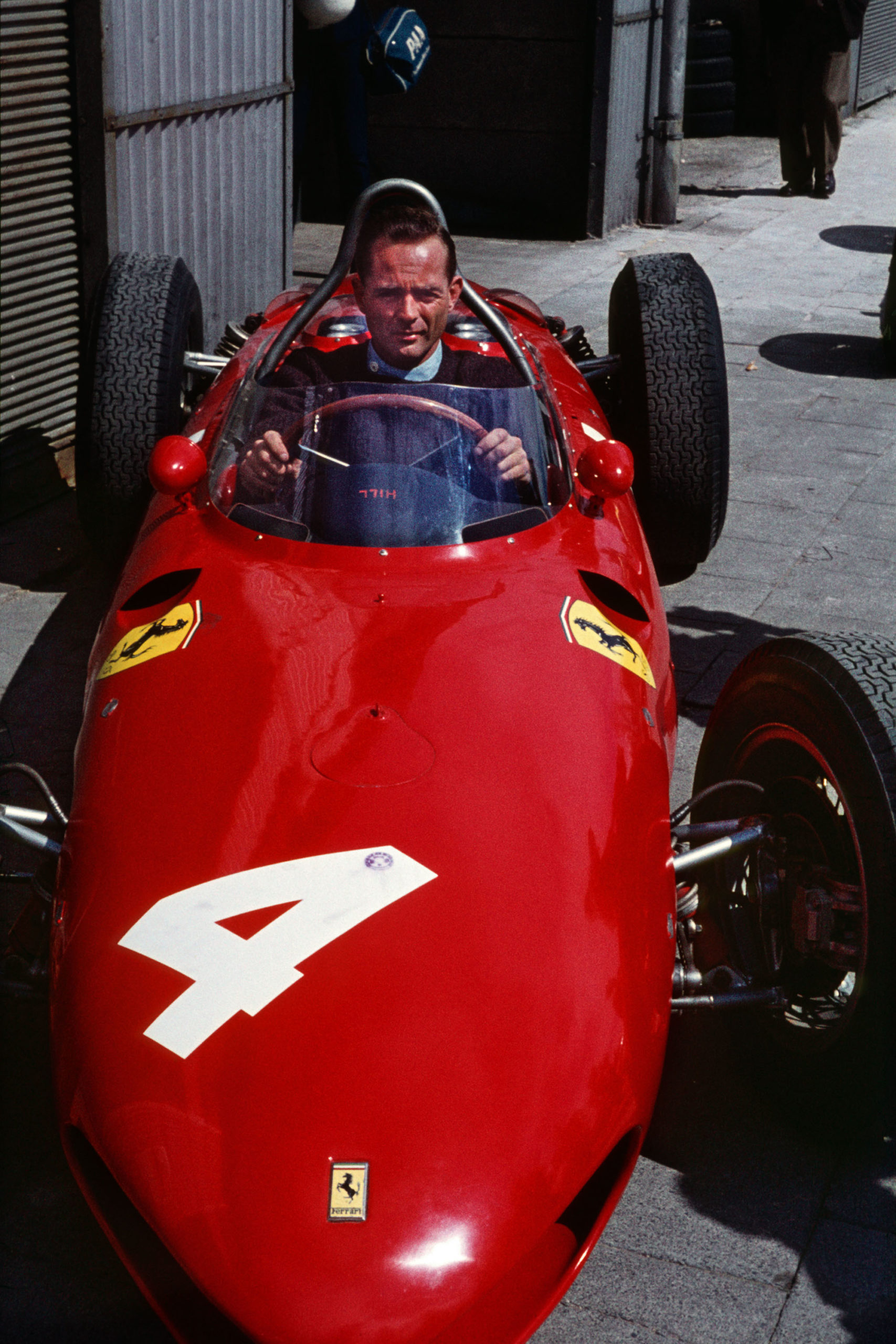 Phil-Hill-in-his-Ferrari-ahead-of-the-1961-German-Grand-Prix-at-the-Nurburgring