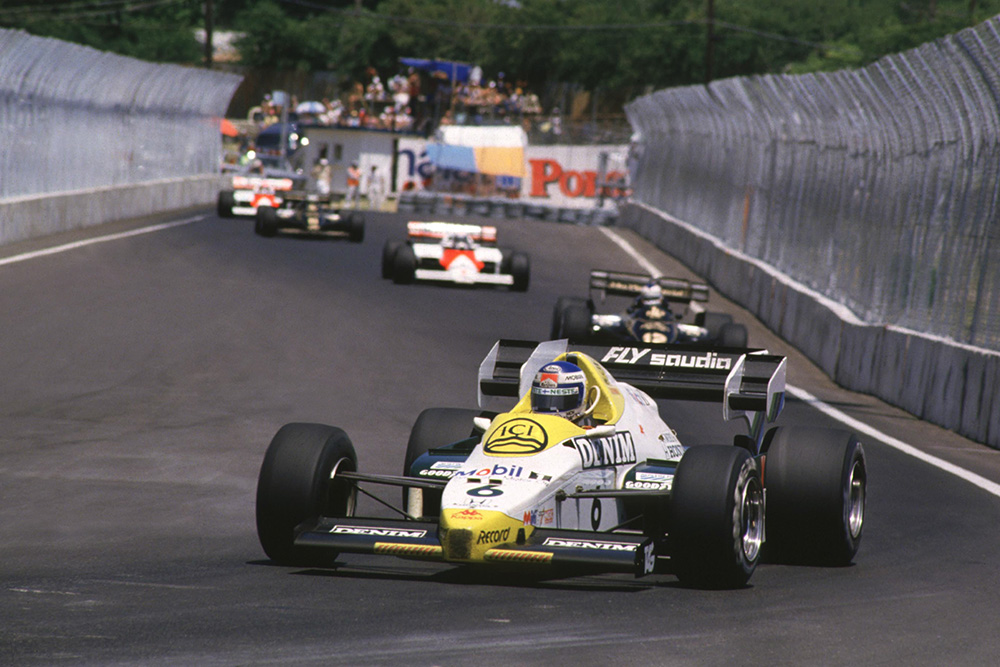 Keke Rosberg leads in his Williams FW09 Honda.
