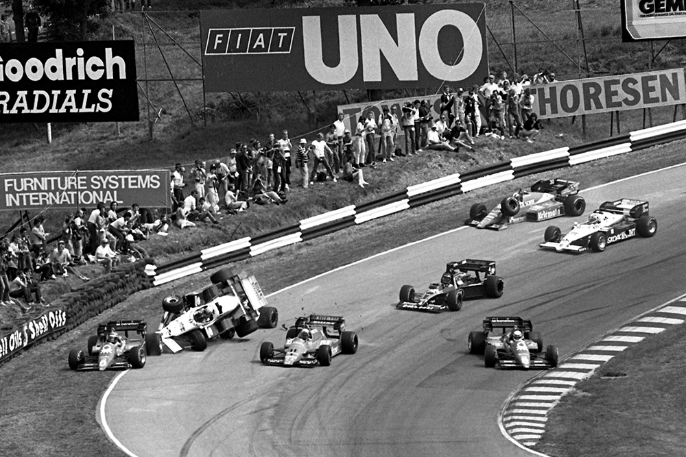Riccardo Patrese's Alfa Romeo 184T, snapped sideways leading to a multi-car accident on the first lap.