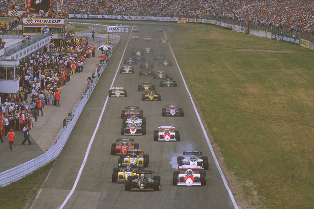 Manfred Winkelhock in his ATS leads a mid field group.