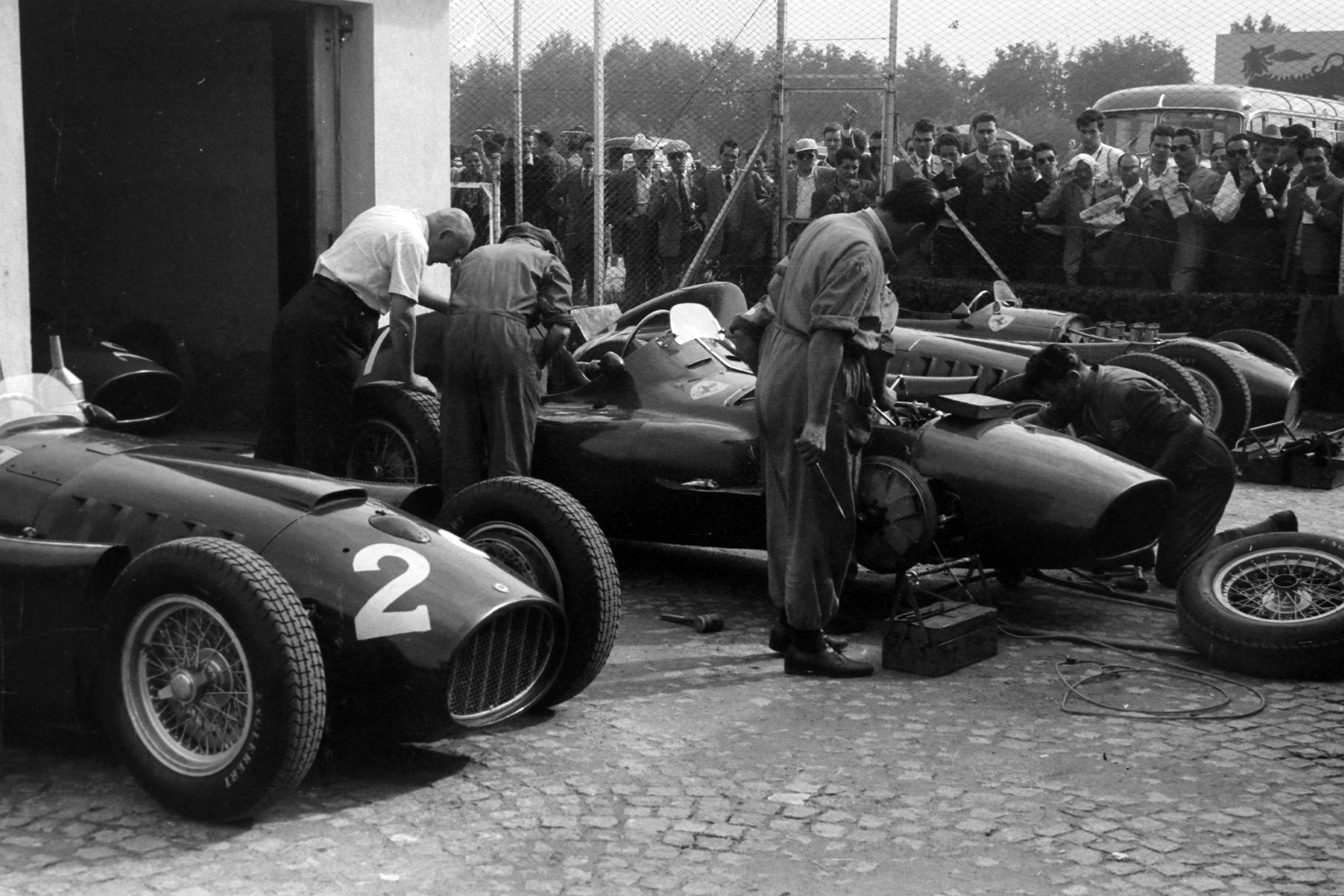 Ferraris are prepared in the pits
