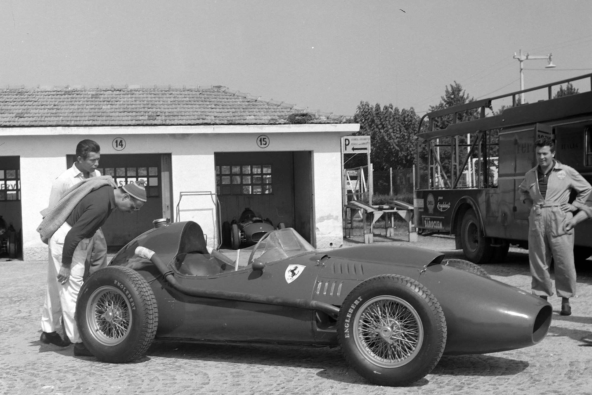 A Ferrari 246 in the paddock