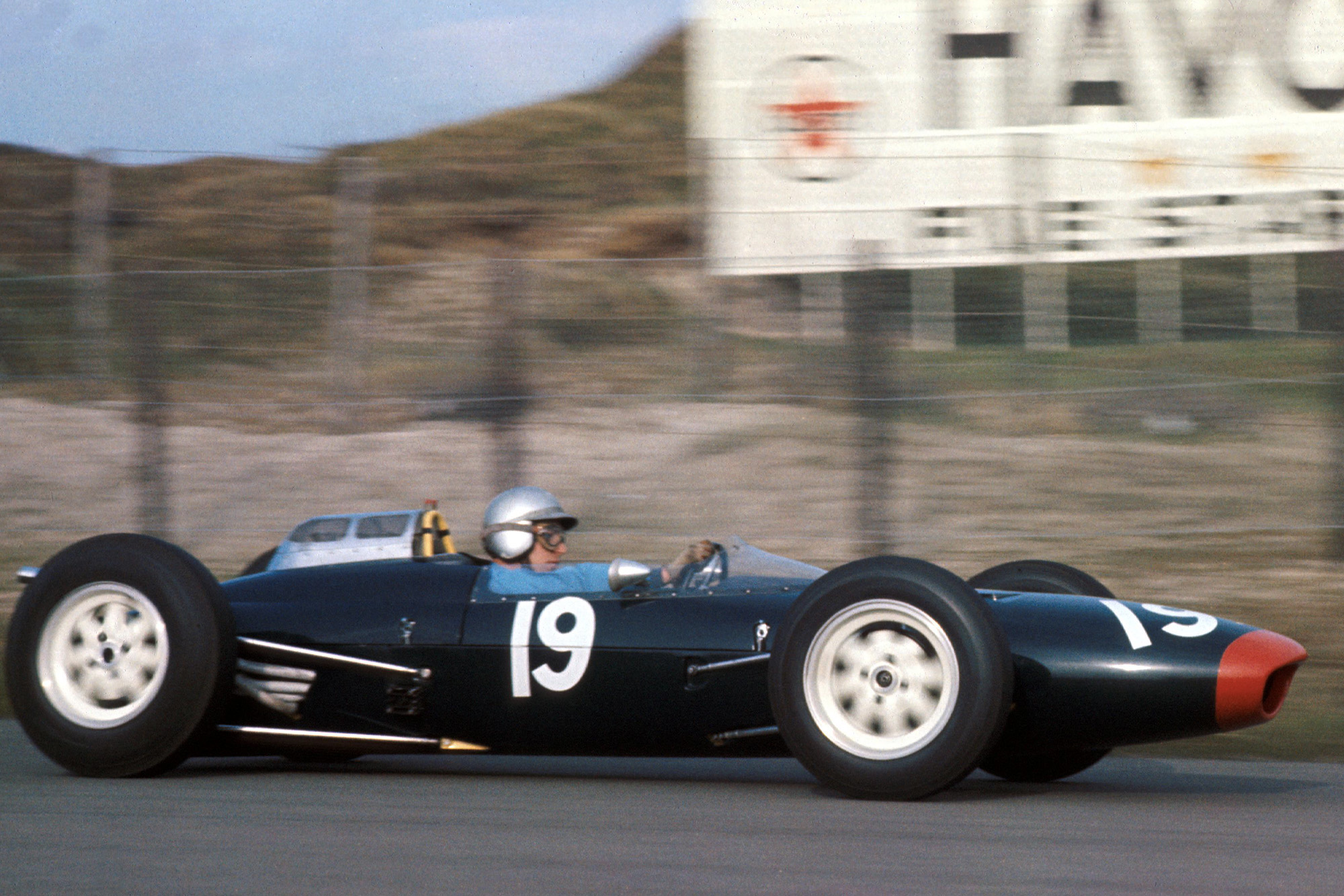 Surtees impressed in the Lola Mk4, matching Ferrari's Phil Hill
