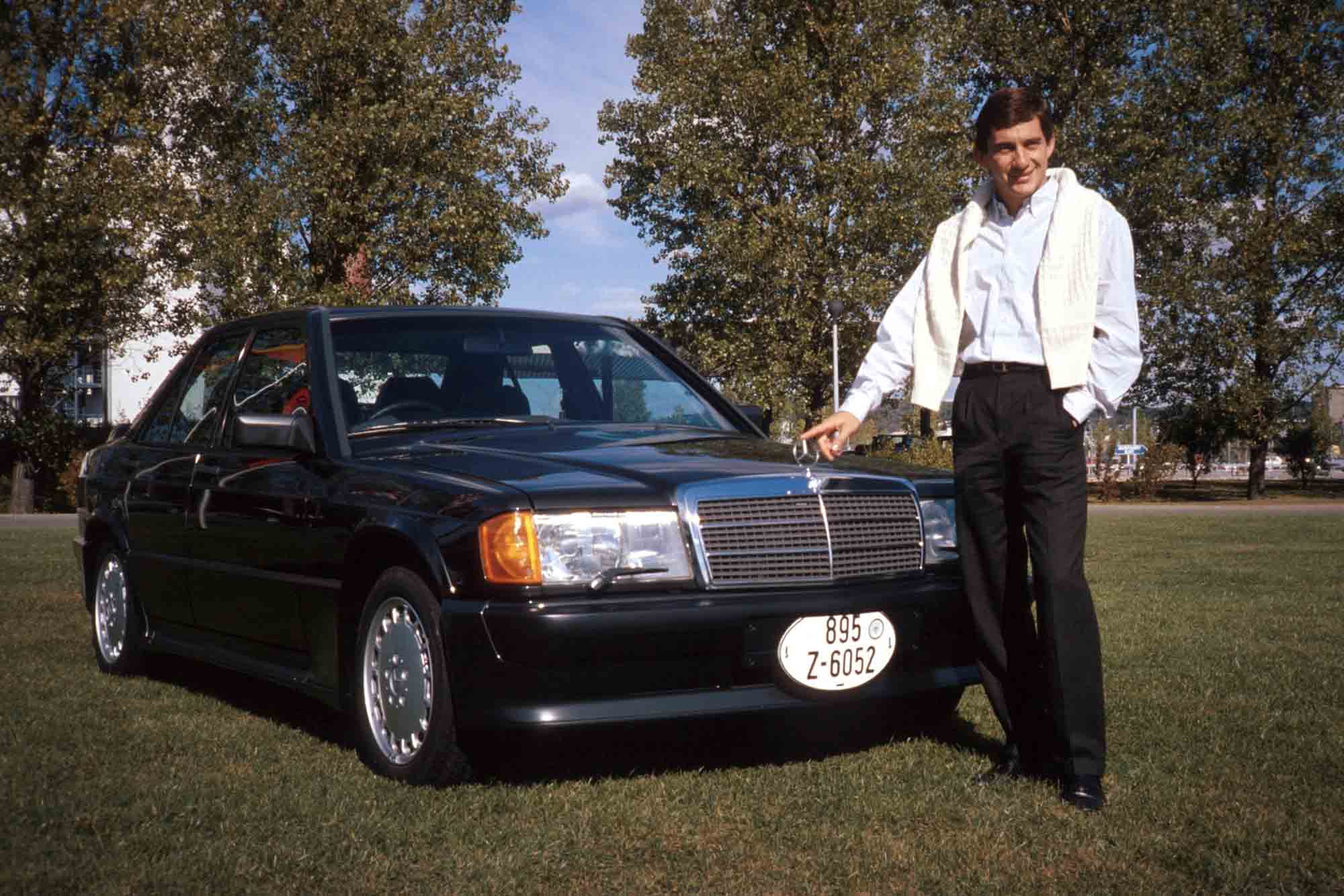 Ayrton Senna poses with a Mercedes road car Brazil 1984