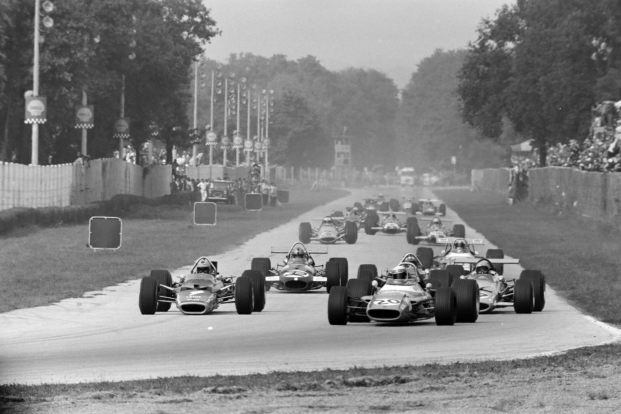 The field heads into the Curva Sud on the first lap of the 1969 Italian Grand Prix