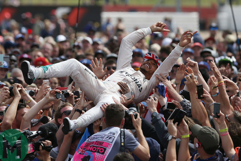 Lewis Hamilton crowd surfing after winning the 2016 British Grand Prix at Silverstone