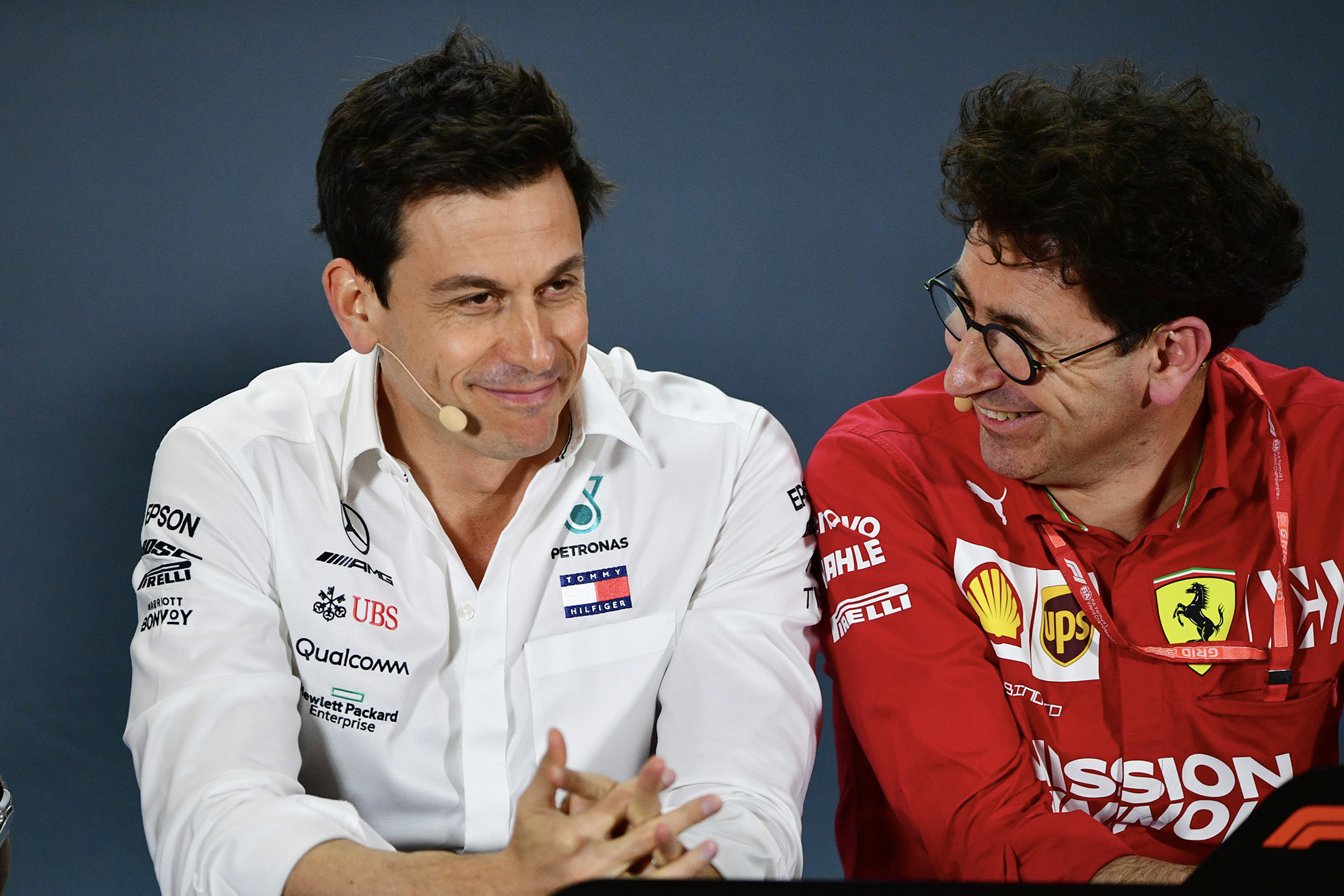 Toto Wolff smiles with Mattia Binotto