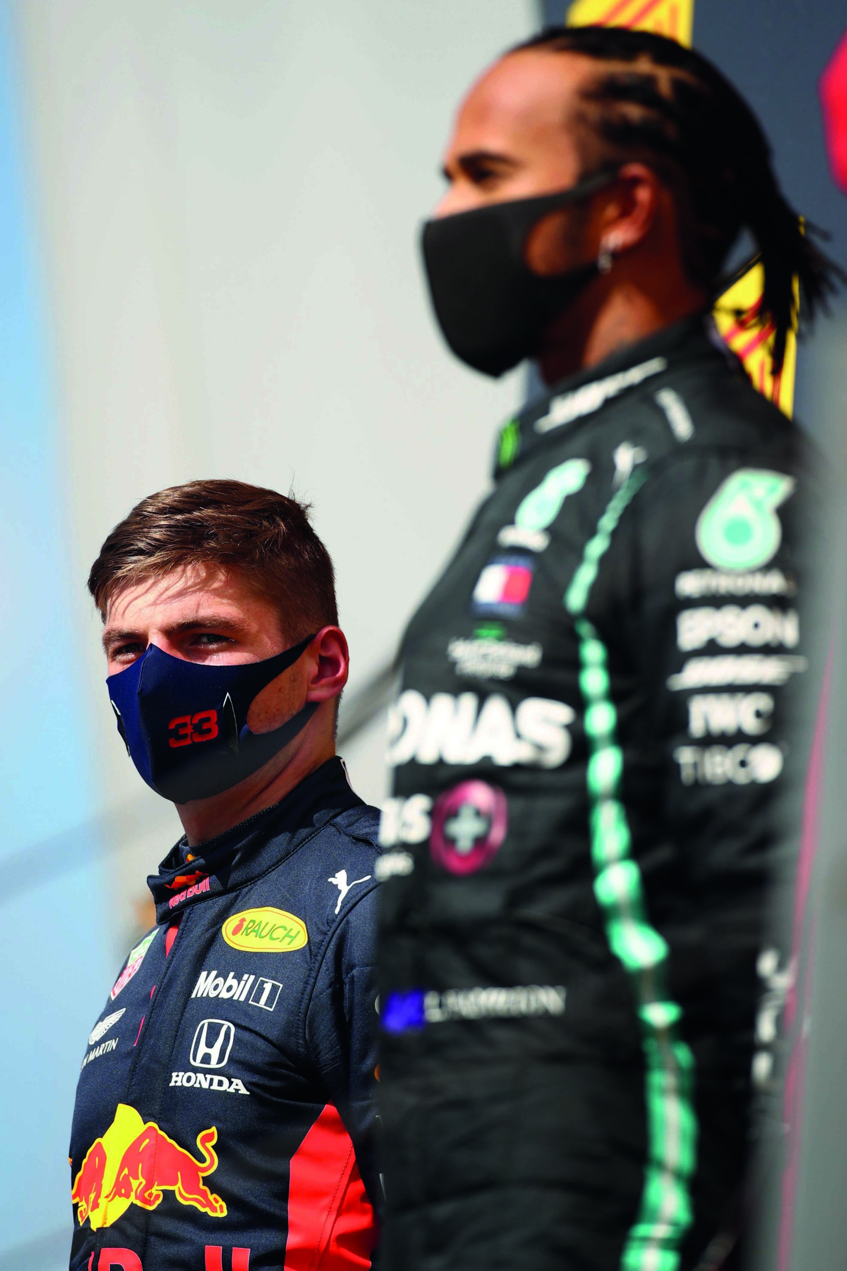 Lewis-Hamilton-on-the-podium-next-to-Max-Verstappen-after-winning-the-2020-Spanish-Grand-Prix-at-Barcelona