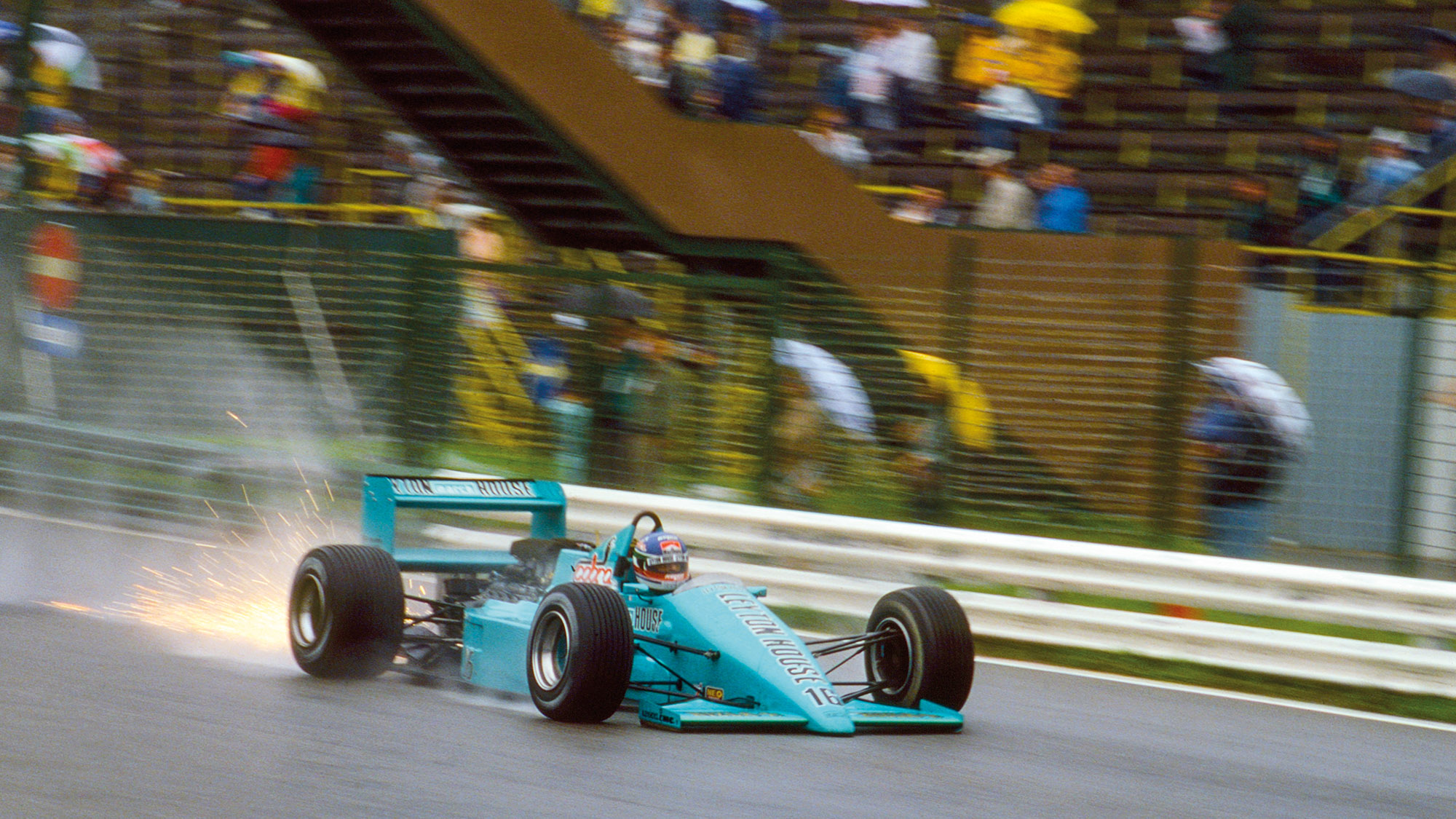Sparks fly from Ivan Capelli's March 871 at the 1987 Austrian Grand prix